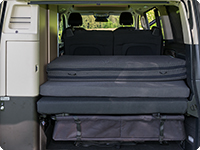 The iXTEND folding bed consists of three parts and can be stowed folded on the rear board of the Mercedes-Benz Marco Polo (2014 –>).
