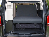 All iXTEND folding beds can be flipped over and folded to the backrest of the 2 seater bench of the Mercedes-Benz Marco Polo in a way that a big storage or lying area is create without gaps. 