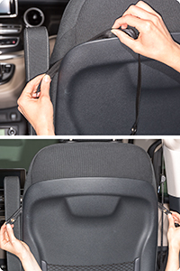On the sides, a strap made of polyester is hung into the plastic shell of the backrest.